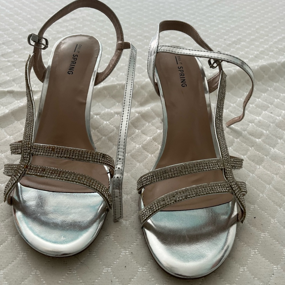 Silver high heel shoes